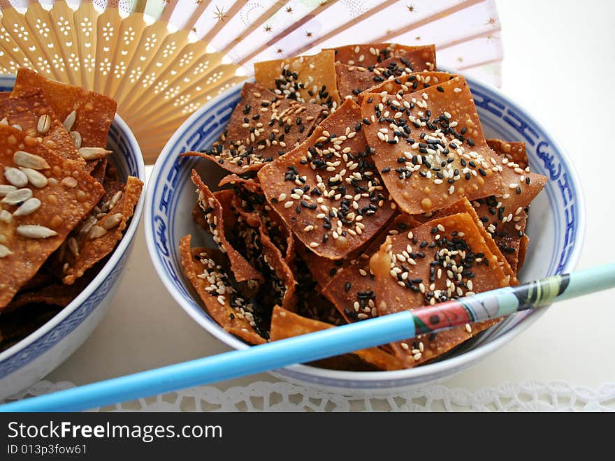 Some chinese wan tan cockies with sesame seeds