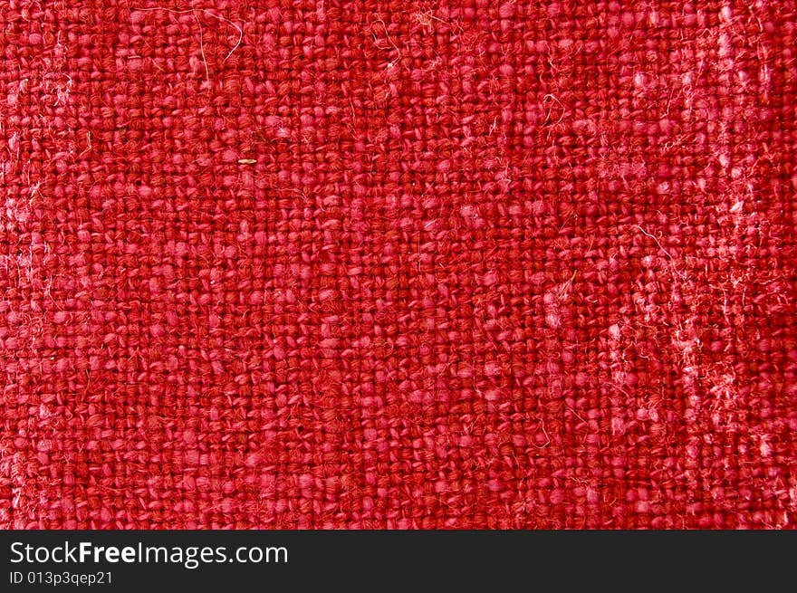 Detail of a red fabric texture, cotton made