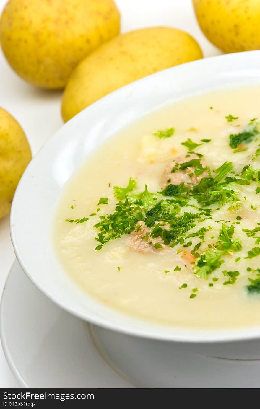 Potato cream soup with chopped meat balls