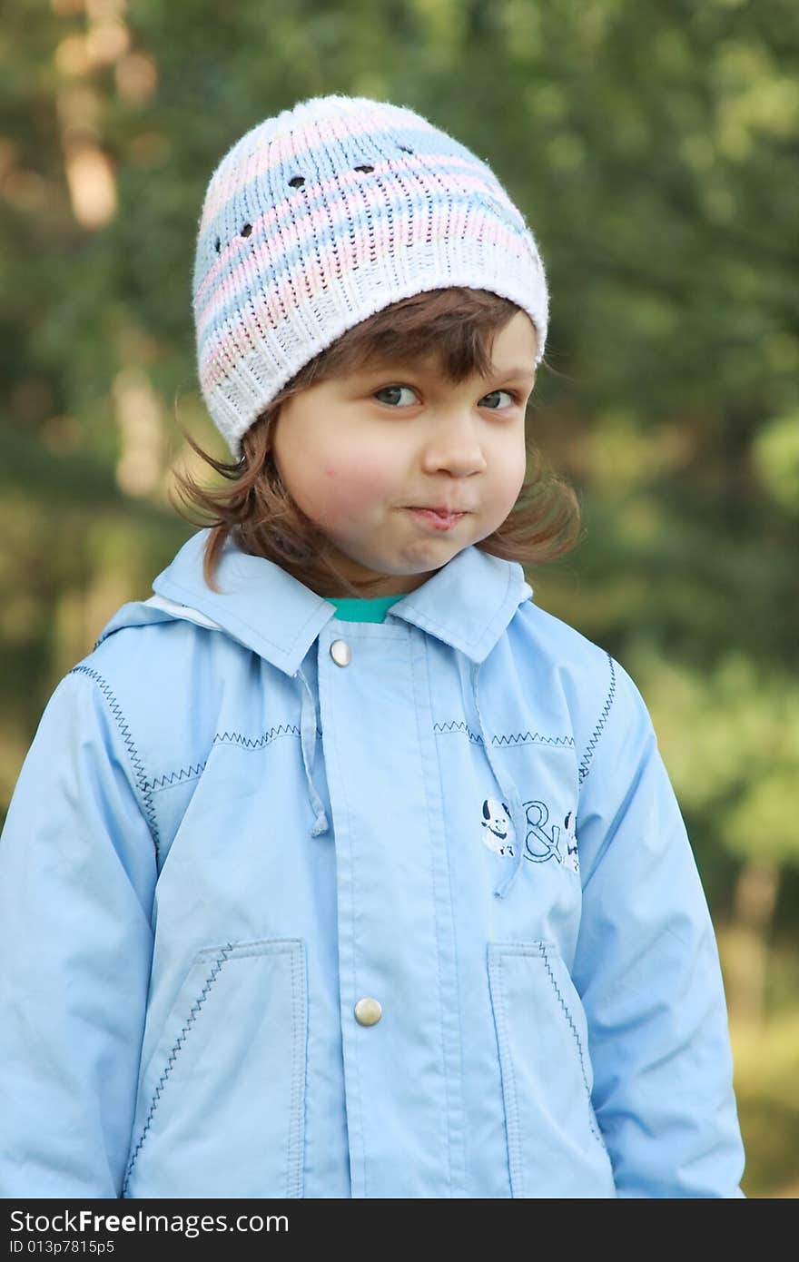 Happy little girl  in autumn