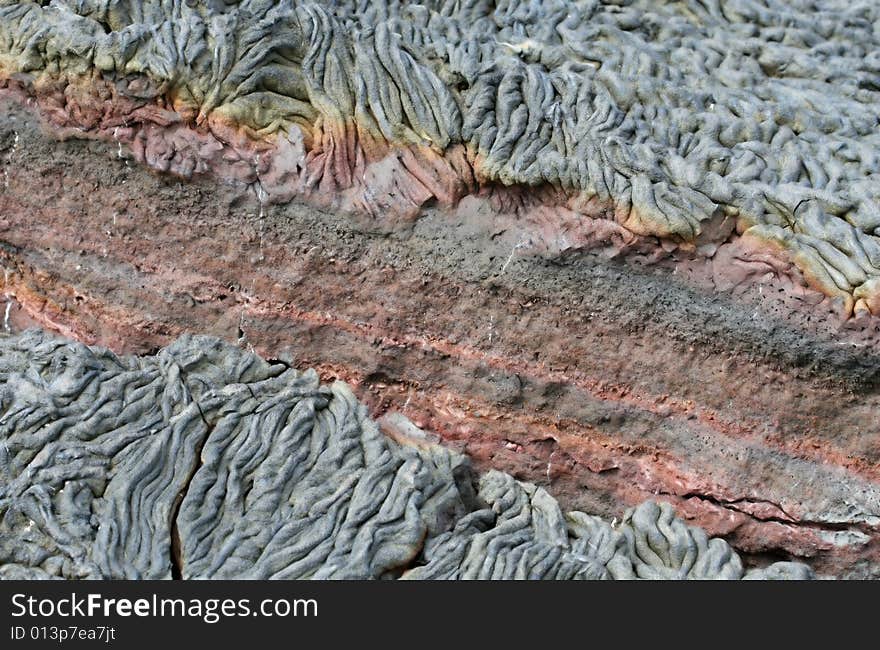 Bizarre colors formed in the lava flow on the galapagos islands