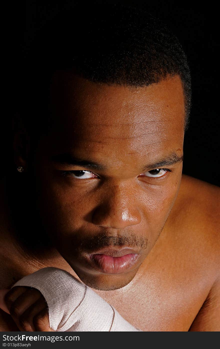 African american boxer warming up