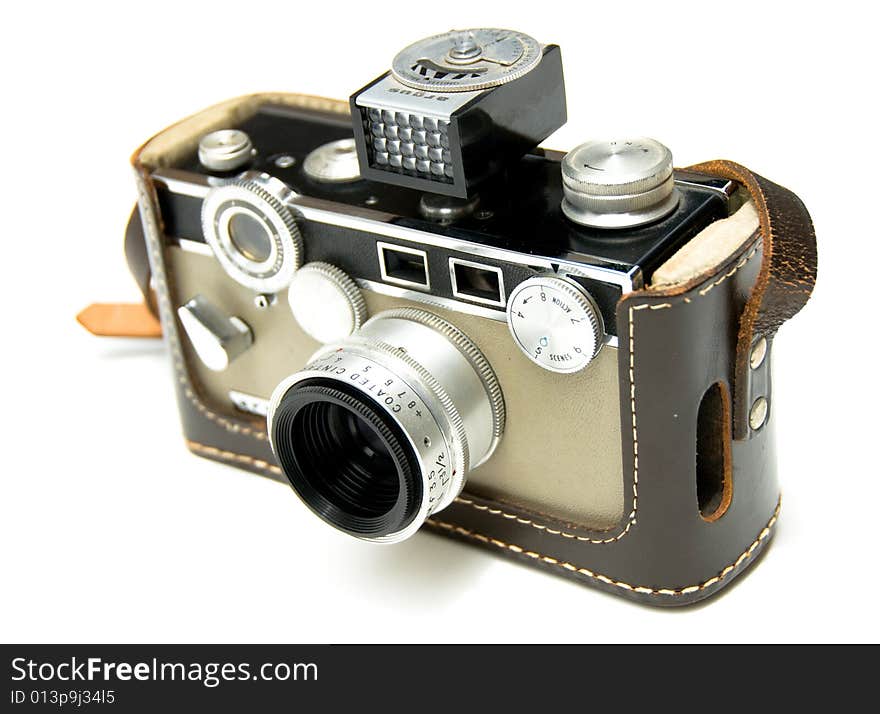 Two tone vintage 35mm film camera with flash attached isolated on a white background. Two tone vintage 35mm film camera with flash attached isolated on a white background.