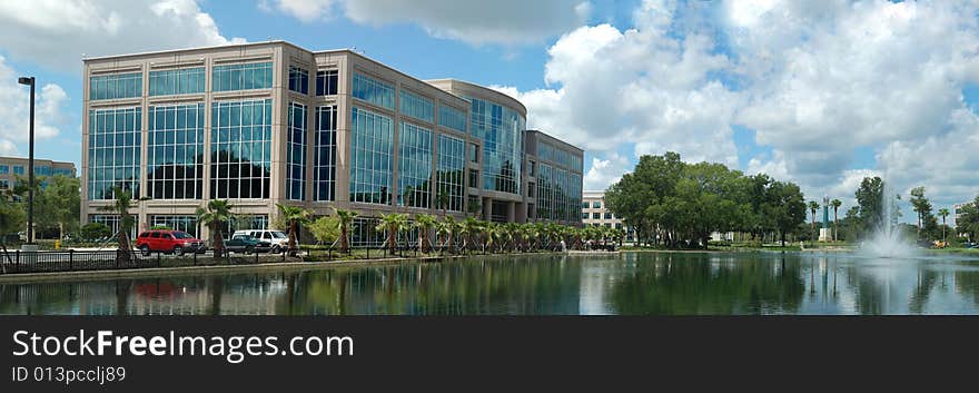 Office building with fountain and retention pond. Office building with fountain and retention pond.