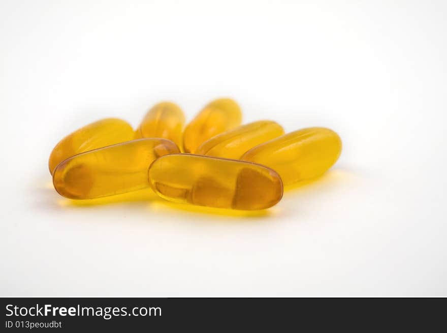 Translucent pills on a white background