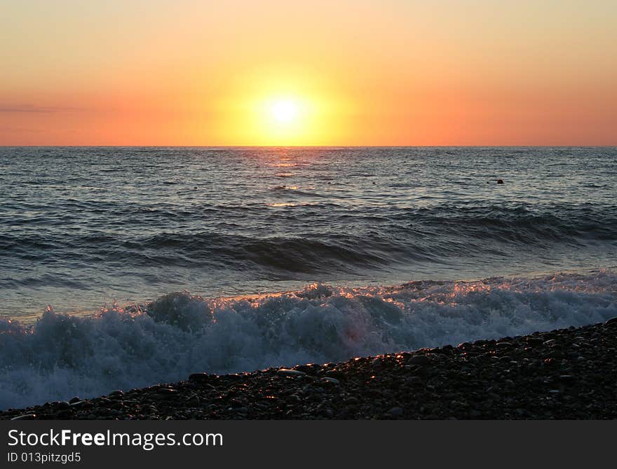 Wave on sea beach under year blue sky and cloud