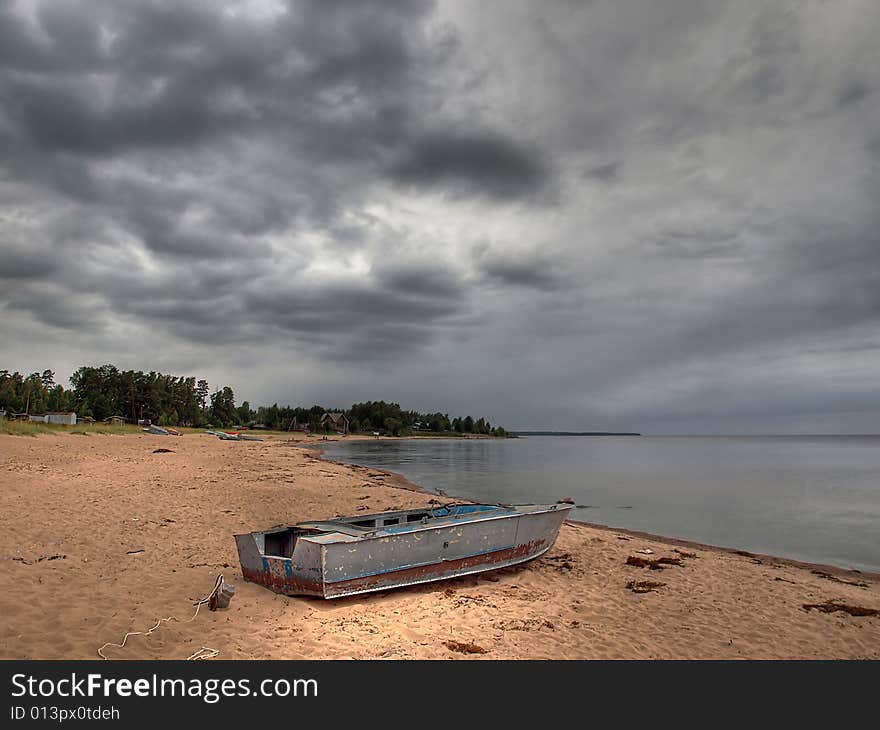 Boat on the shore of the Ladoga lake, Russia. Boat on the shore of the Ladoga lake, Russia