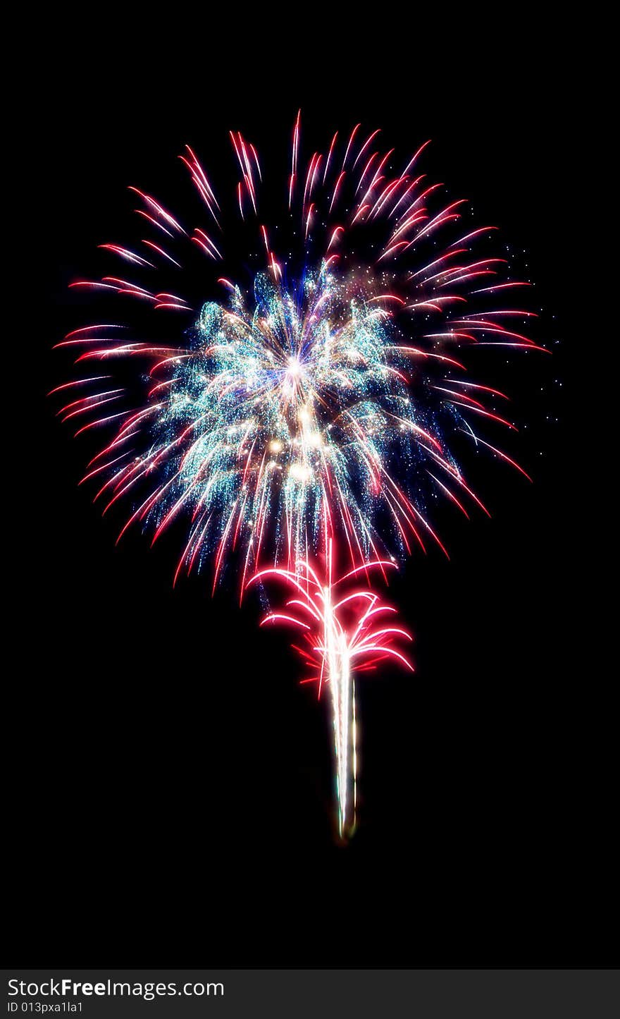 Fireworks composition photographed with long exposure, isolated on black.