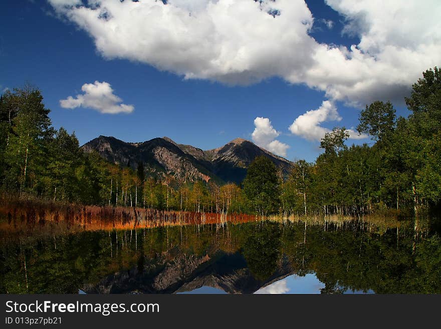 Mountain Flat in the summer showing all the colors with mountains in the background. Mountain Flat in the summer showing all the colors with mountains in the background