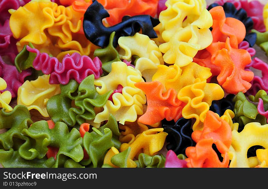 Curly colourful pasta, an ideal food background. Curly colourful pasta, an ideal food background