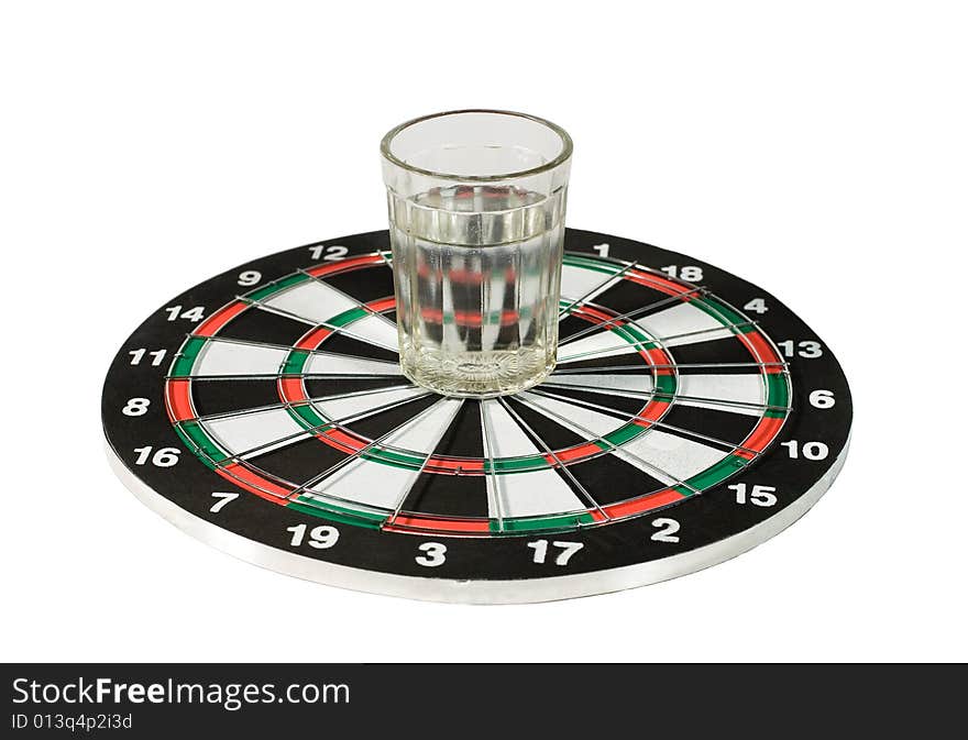 Glass of water on a dartboard (isolated on white)