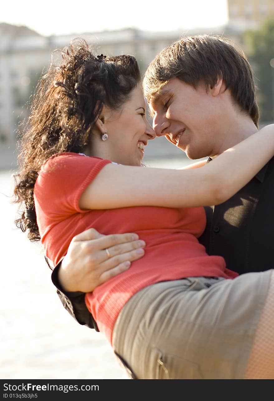 Outdoor portrait of happy young couple