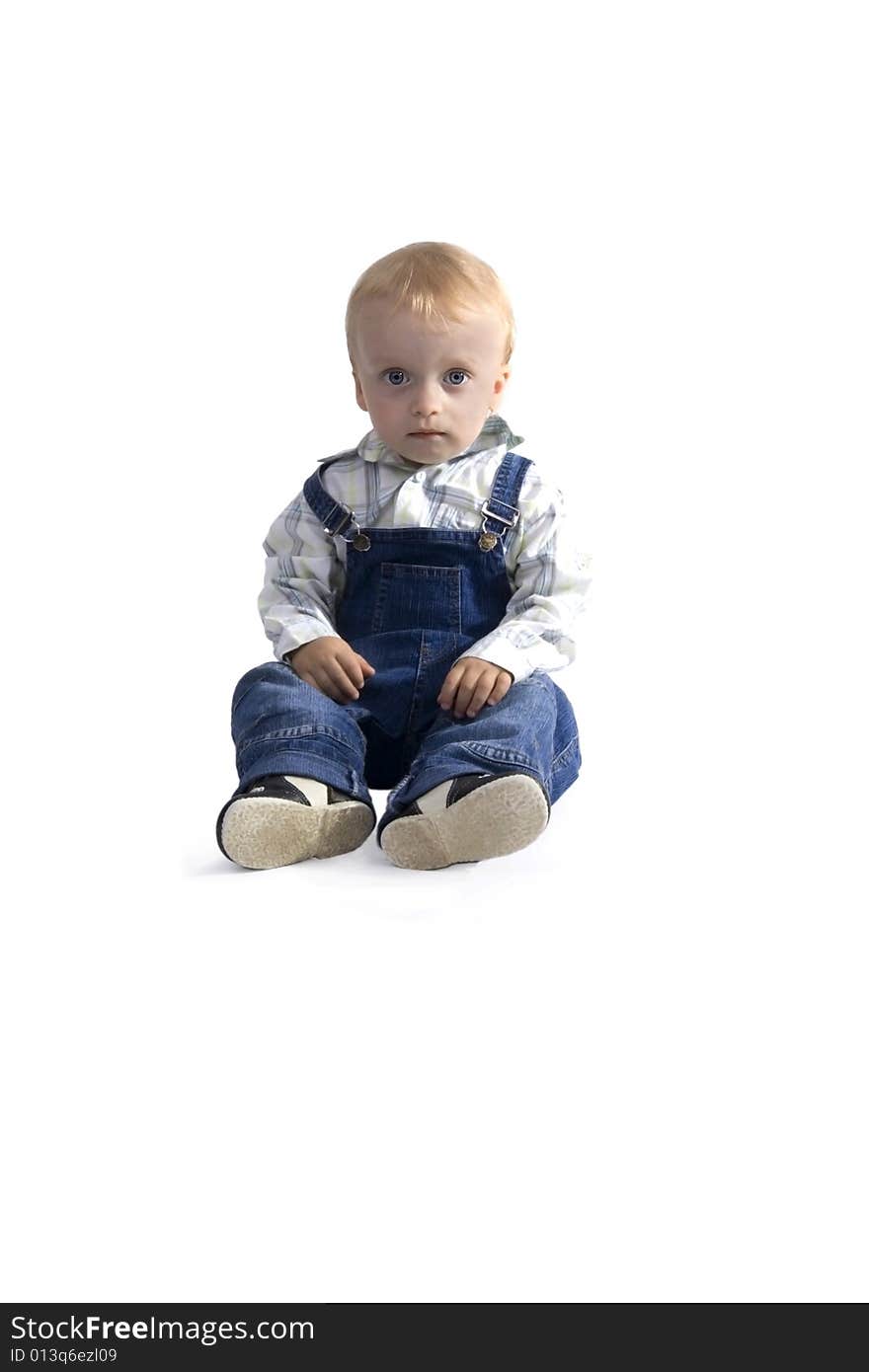 Sitting boy on white background