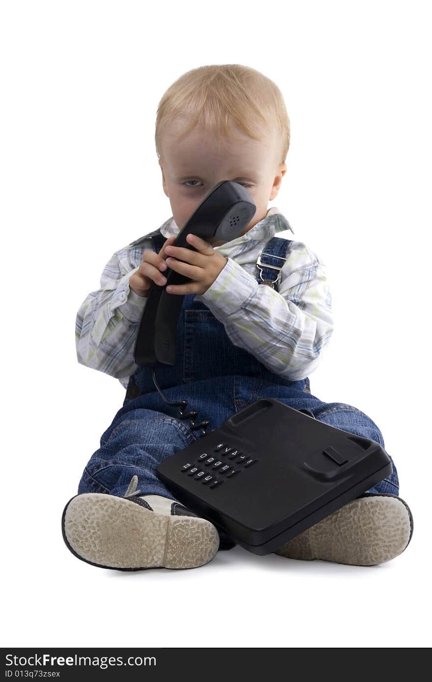 Tired sitting boy with phone on white background. Tired sitting boy with phone on white background