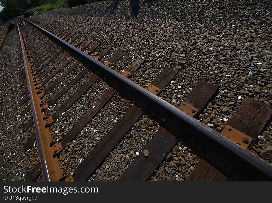 Railroad bridge and tracks in natural environment