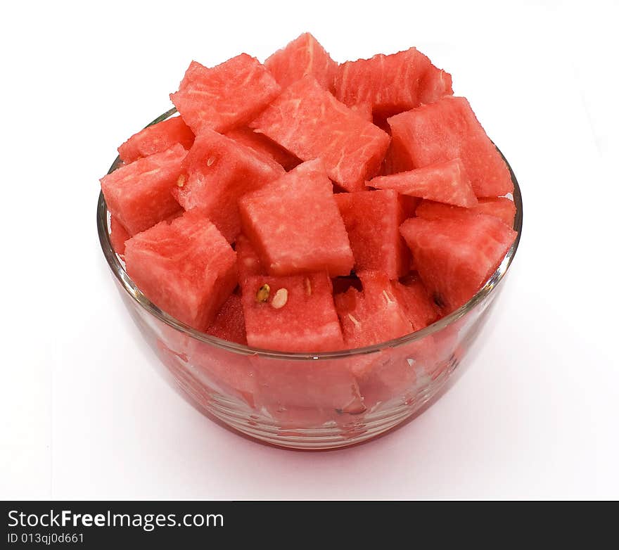 Pieces of watermelon in glass bowl.