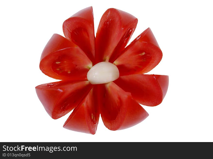 Tomato arranged in flower form isolated on white background