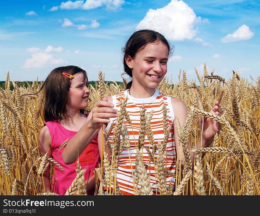 Happy girls on a field