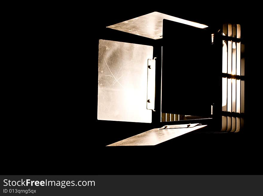 Studio light the barn door model with a bright light aiming sideways