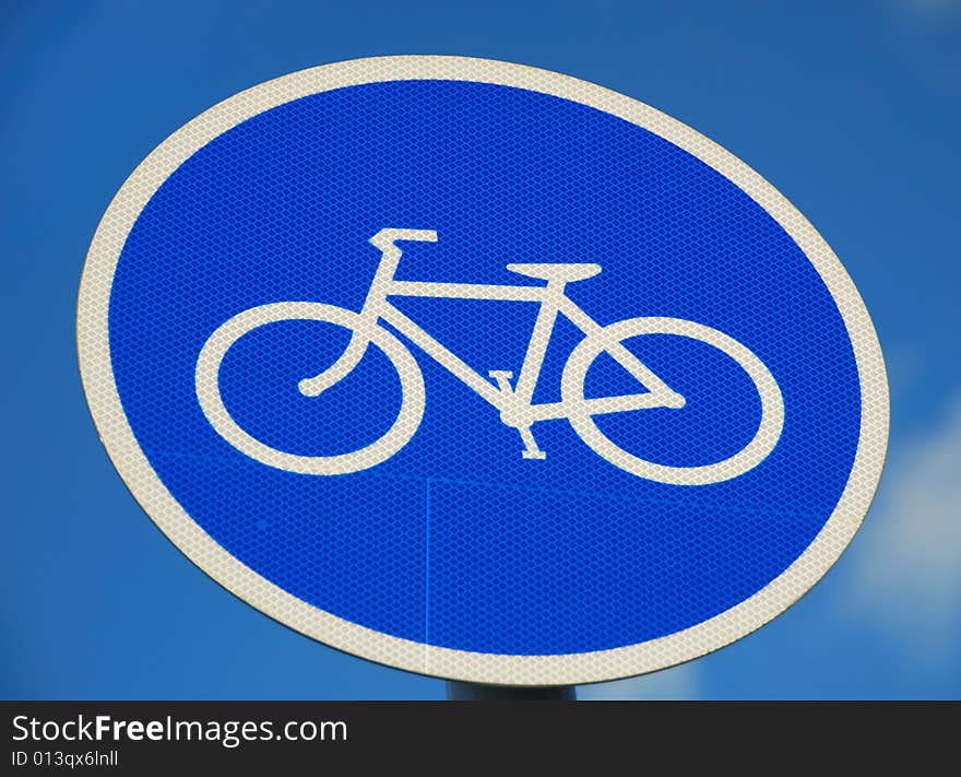 Bicycle road sign with blue sky background