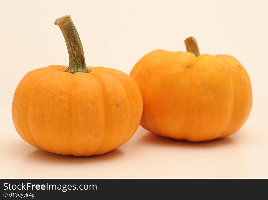 Pumpkins on white