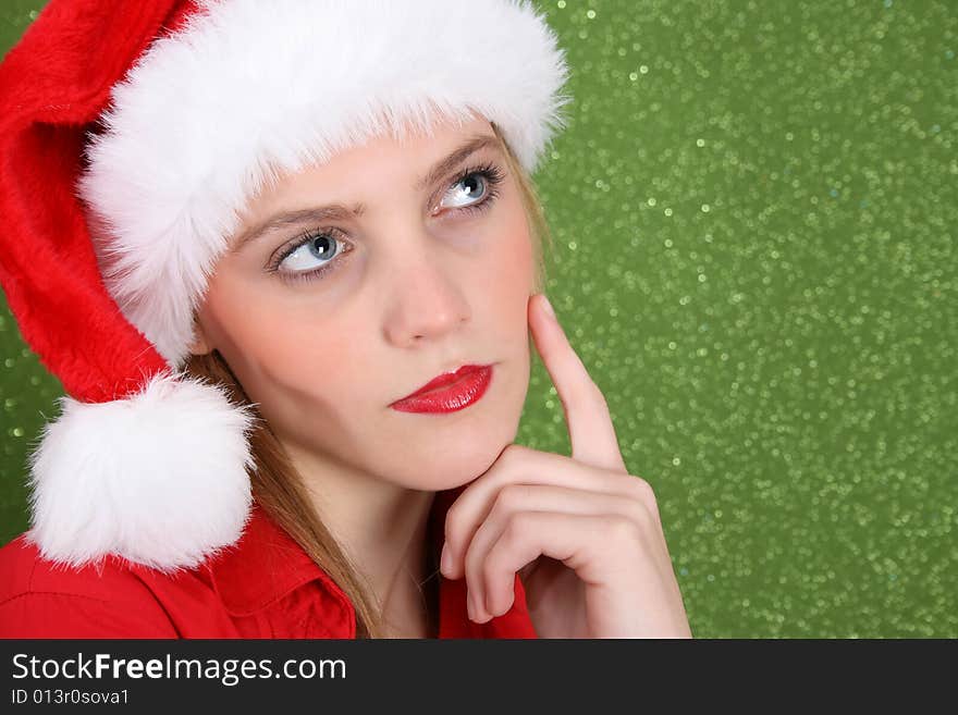 Christmas in deep thought wearing a christmas hat. Christmas in deep thought wearing a christmas hat