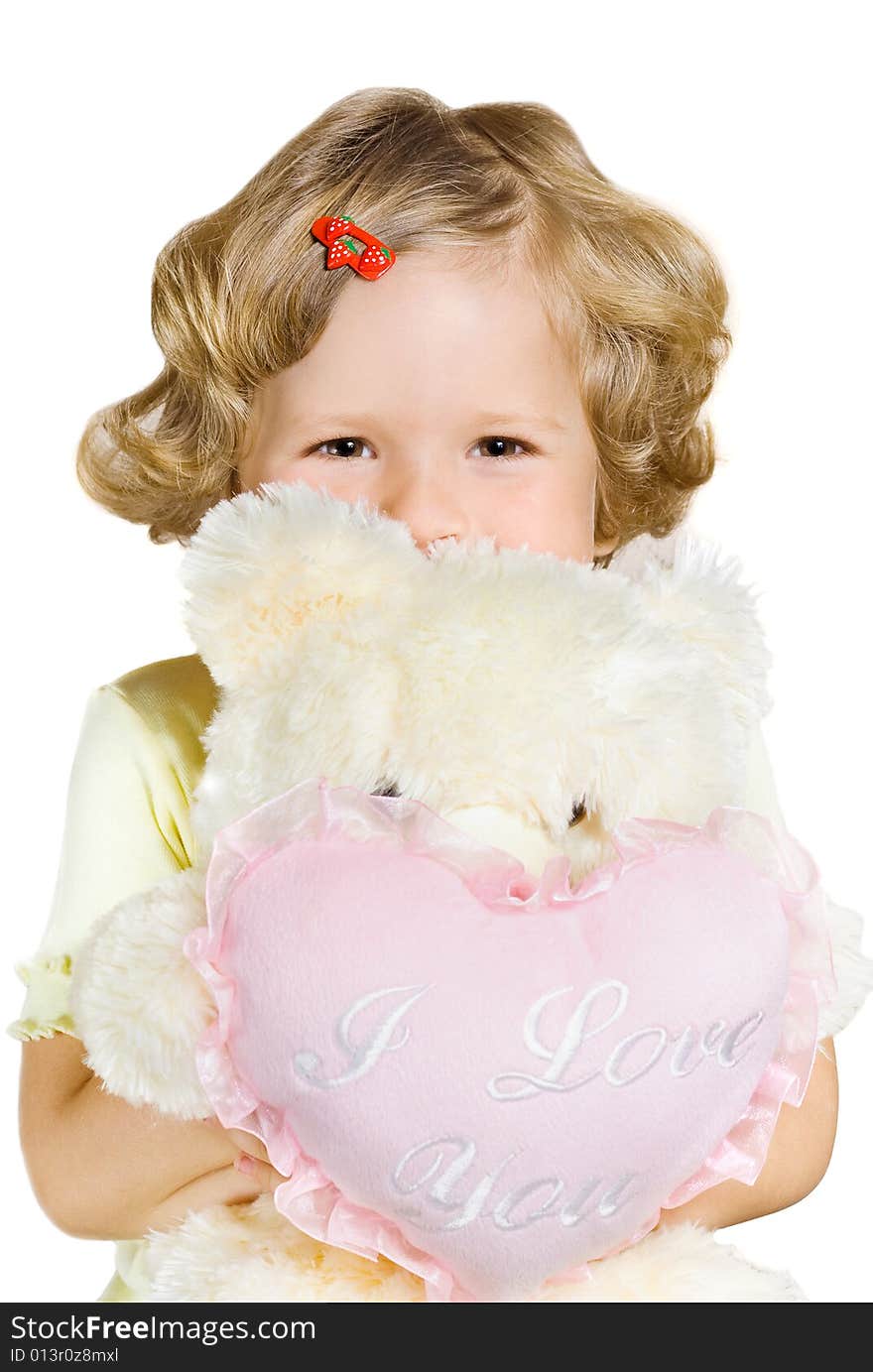 Small beautiful girl holding white teddy bear. Small beautiful girl holding white teddy bear