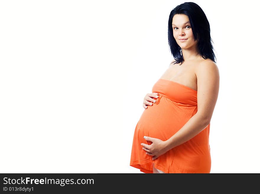 Young pregnant woman. Isolated on white. Young pregnant woman. Isolated on white.