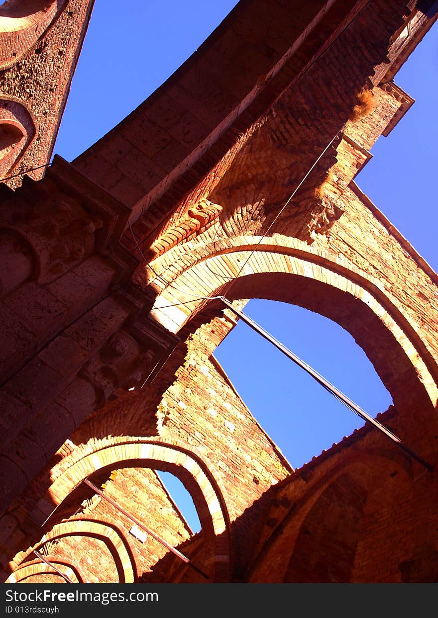 A suggestive shot of the uncover aisles in San Galgano abbey. A suggestive shot of the uncover aisles in San Galgano abbey