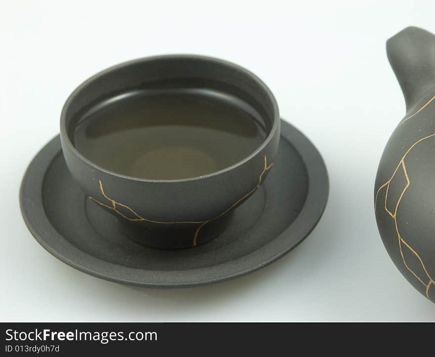 Make Chinese tea with ZiSha earthenware.