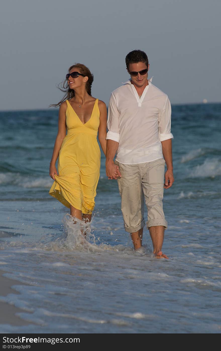 Couple in surf in beach