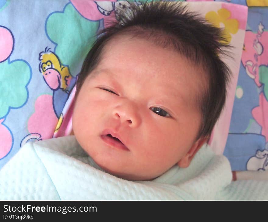 Cute baby on a bed