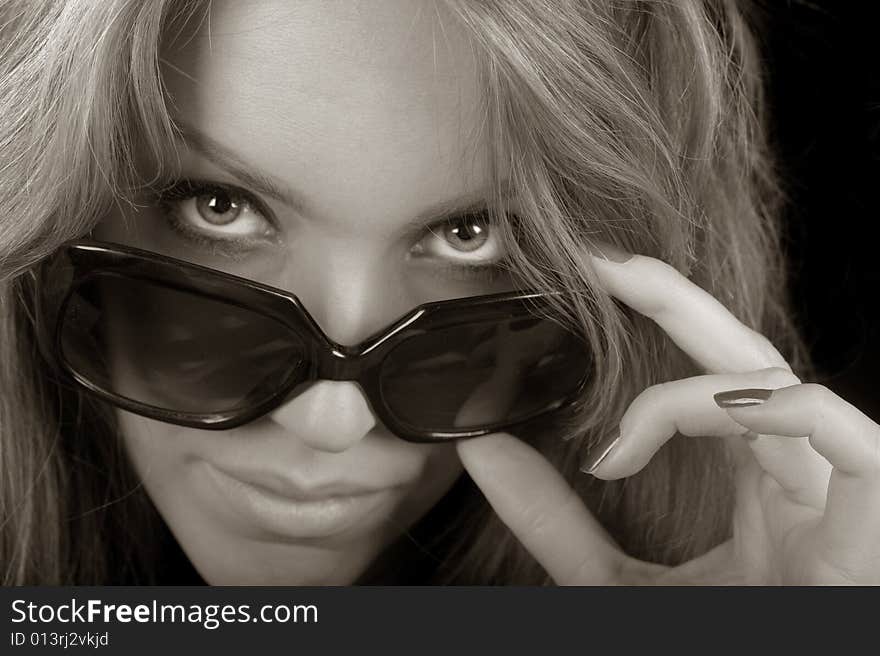 Beautiful Blond portrait of a woman with sunglasses. Beautiful Blond portrait of a woman with sunglasses