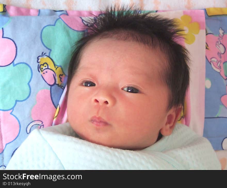 Cute baby on a bed