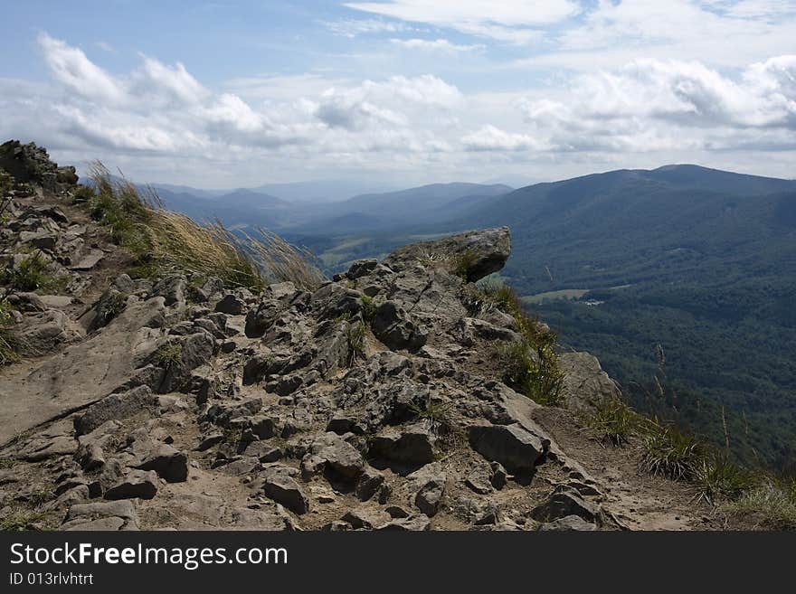 Open view from the edge of the mountain precipice. Open view from the edge of the mountain precipice