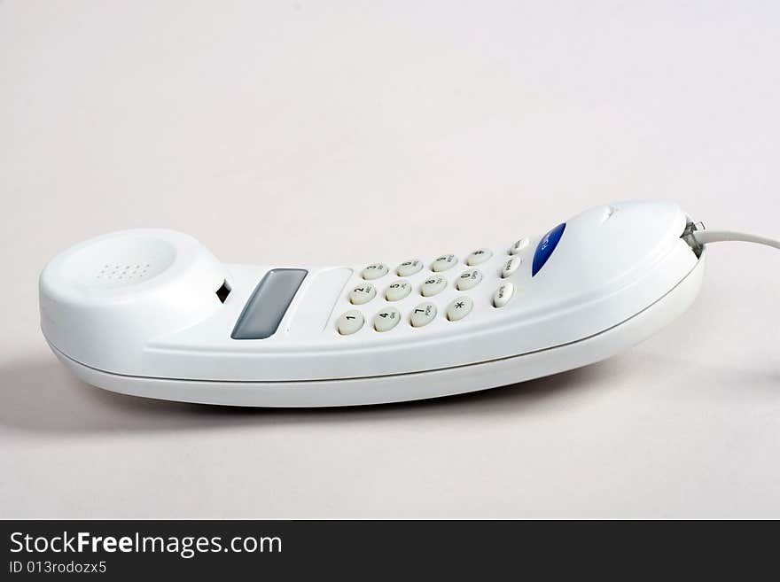 An image of telephone on neutral background