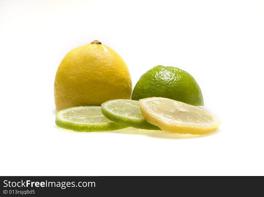 Lemon and lime isolated on white