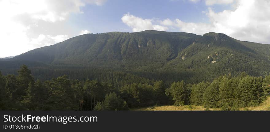 Panorama of a part of Rila mountain, Bulgaria on a sunny summer morning.