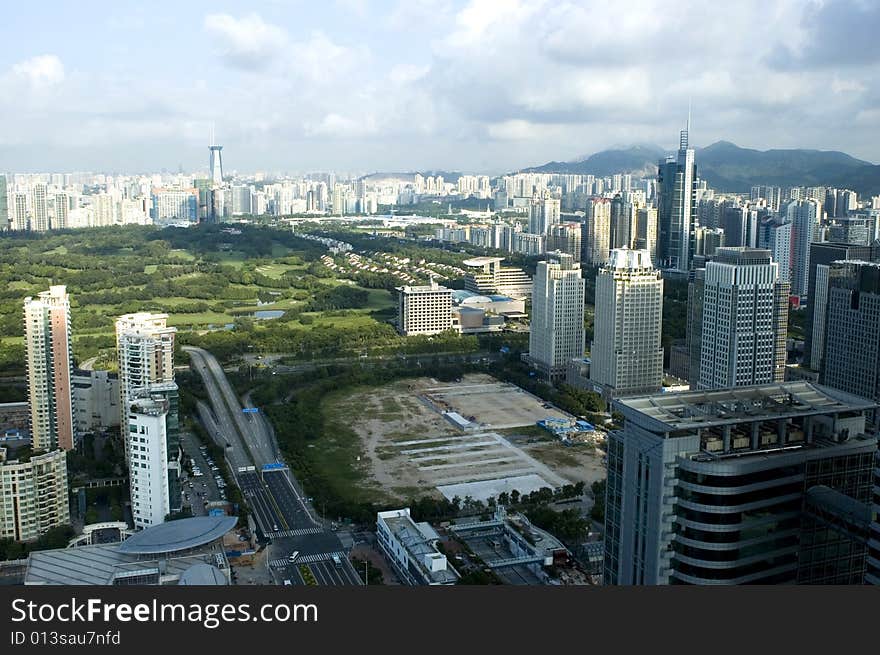 Chinese metropolis - modern Shenzhen city with office's skyscrapers, hotels and residential buildings.