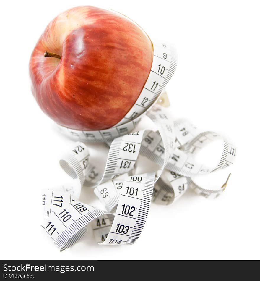 Apple with measuring tape