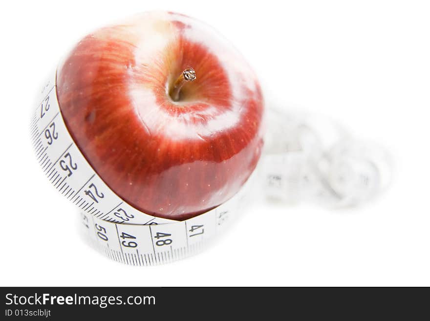 Apple with measuring tape