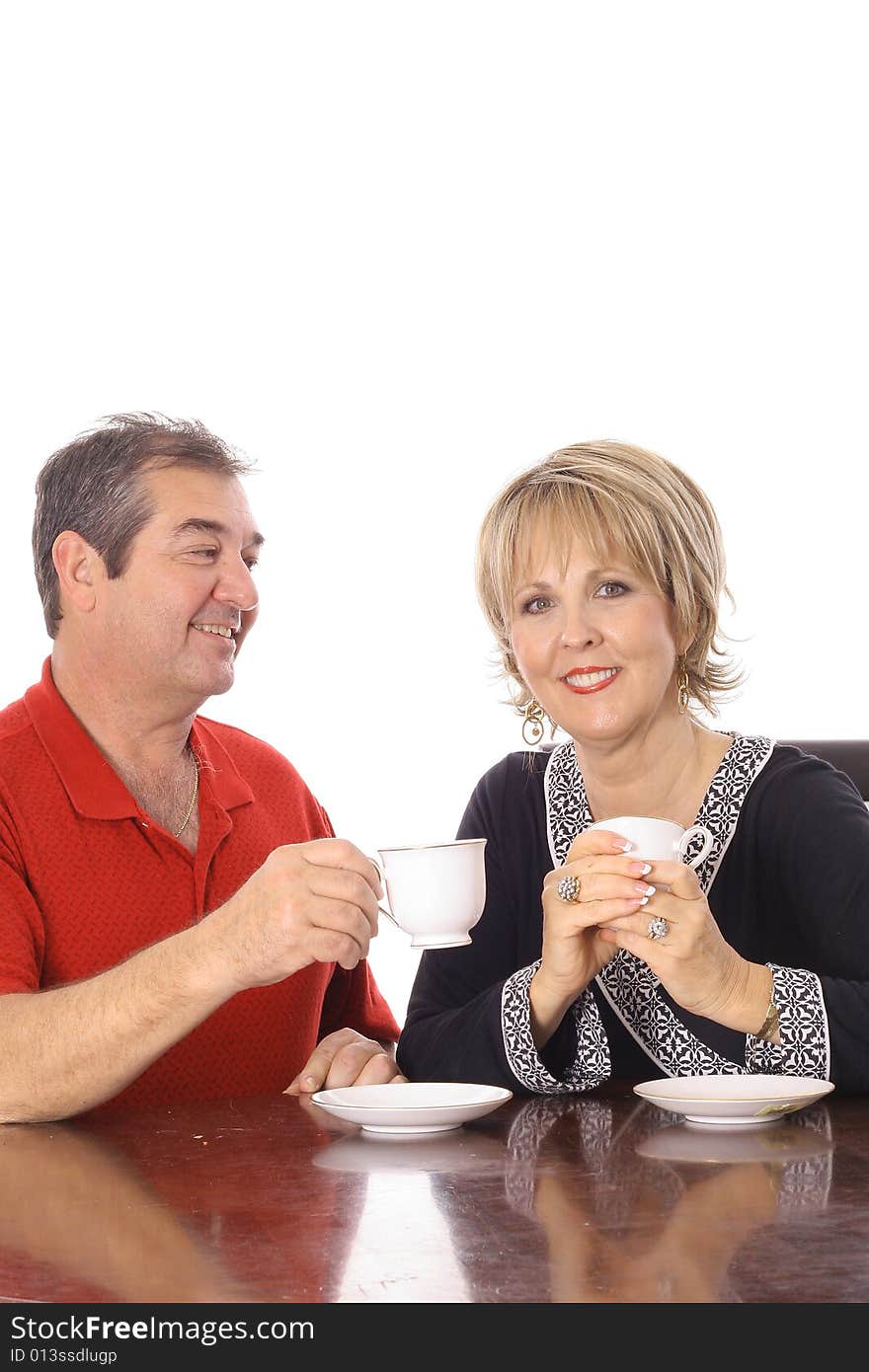 Attractive couple having coffee