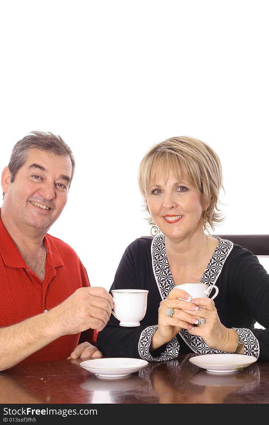 Couple having coffee isolated on white