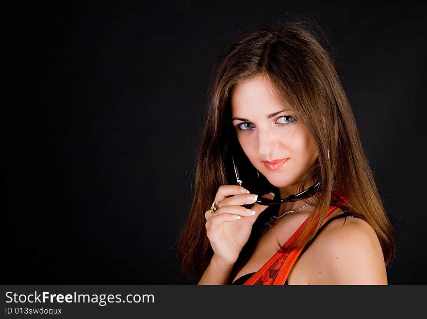 Portrait of the girl in sunglasses on black background. Portrait of the girl in sunglasses on black background