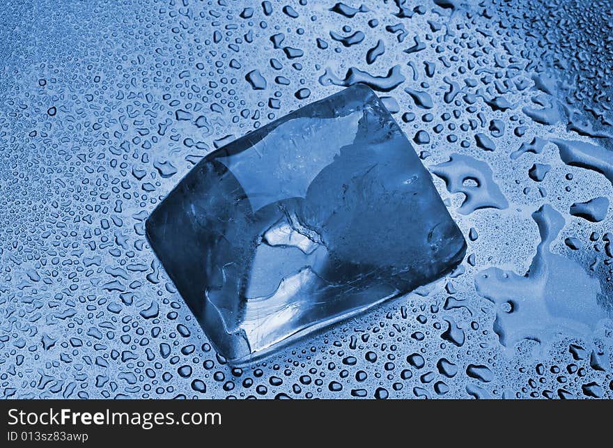 The melting ice cubes with drops