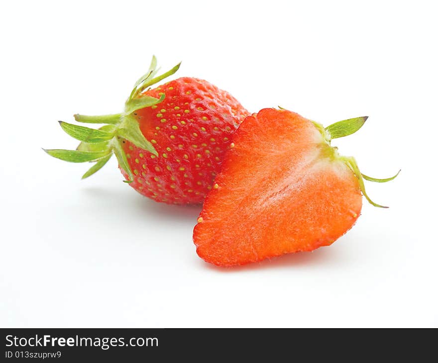 Fresh ripe strawberries isolated on white background.