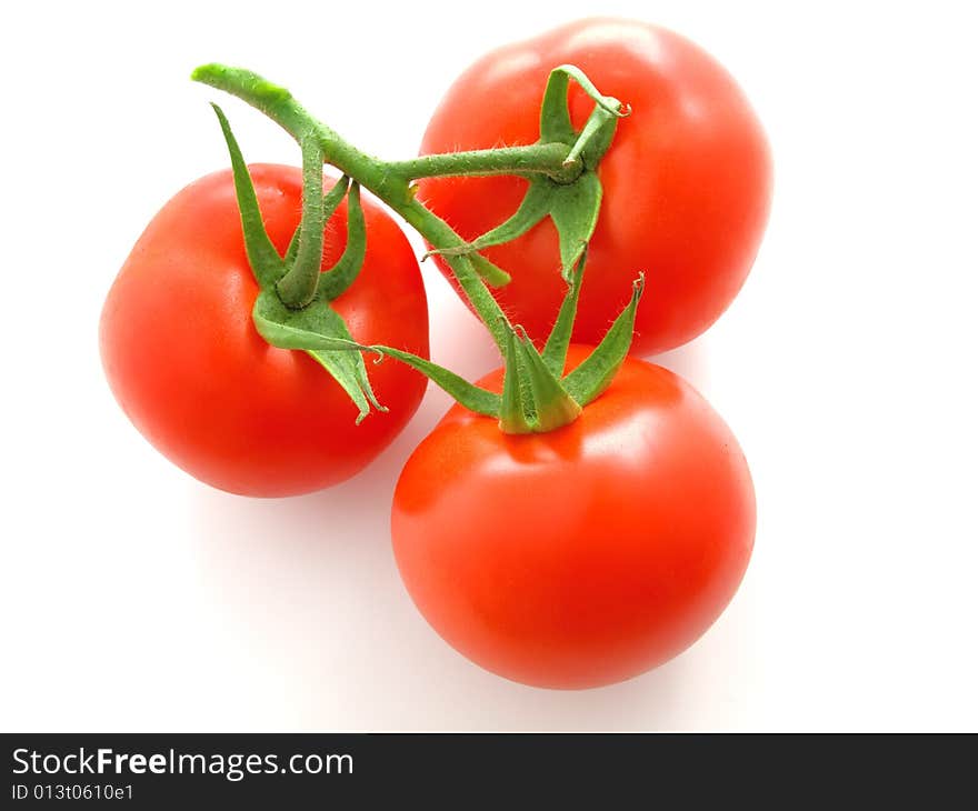 Red tomato isolated on white background.