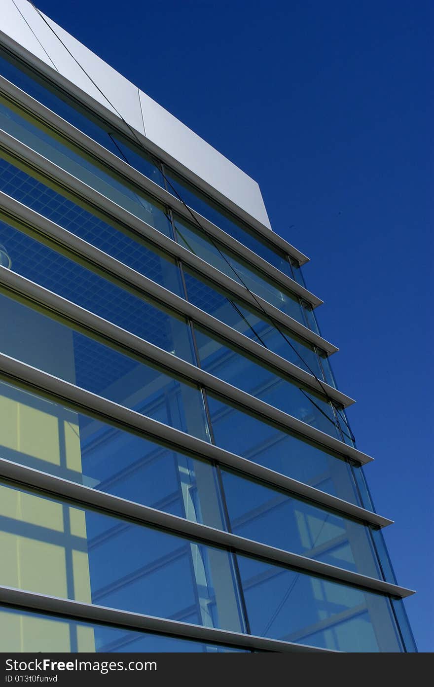 Perspective of a modern house over a clean blue sky. Perspective of a modern house over a clean blue sky