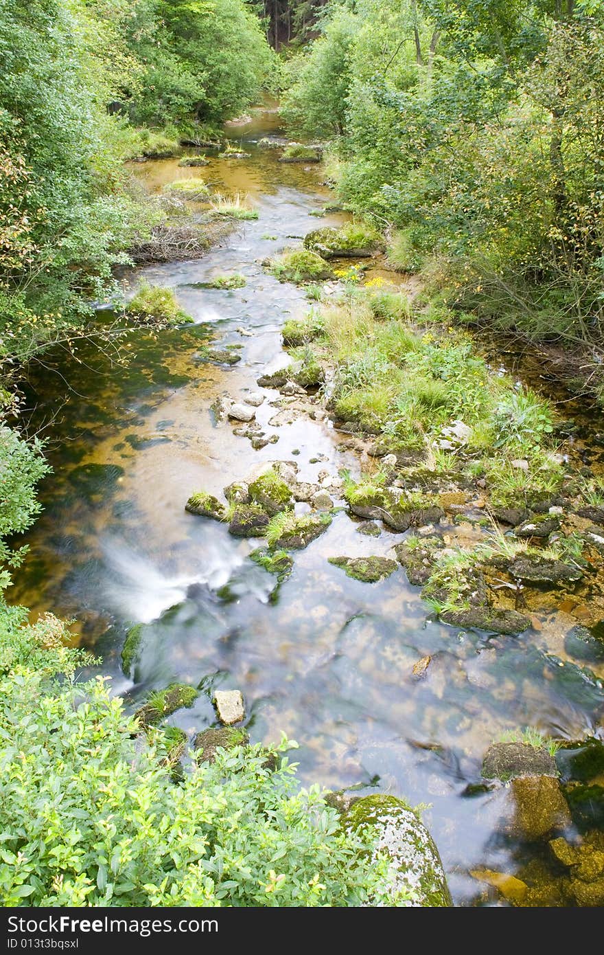 A little stream in the mountain valley. A little stream in the mountain valley