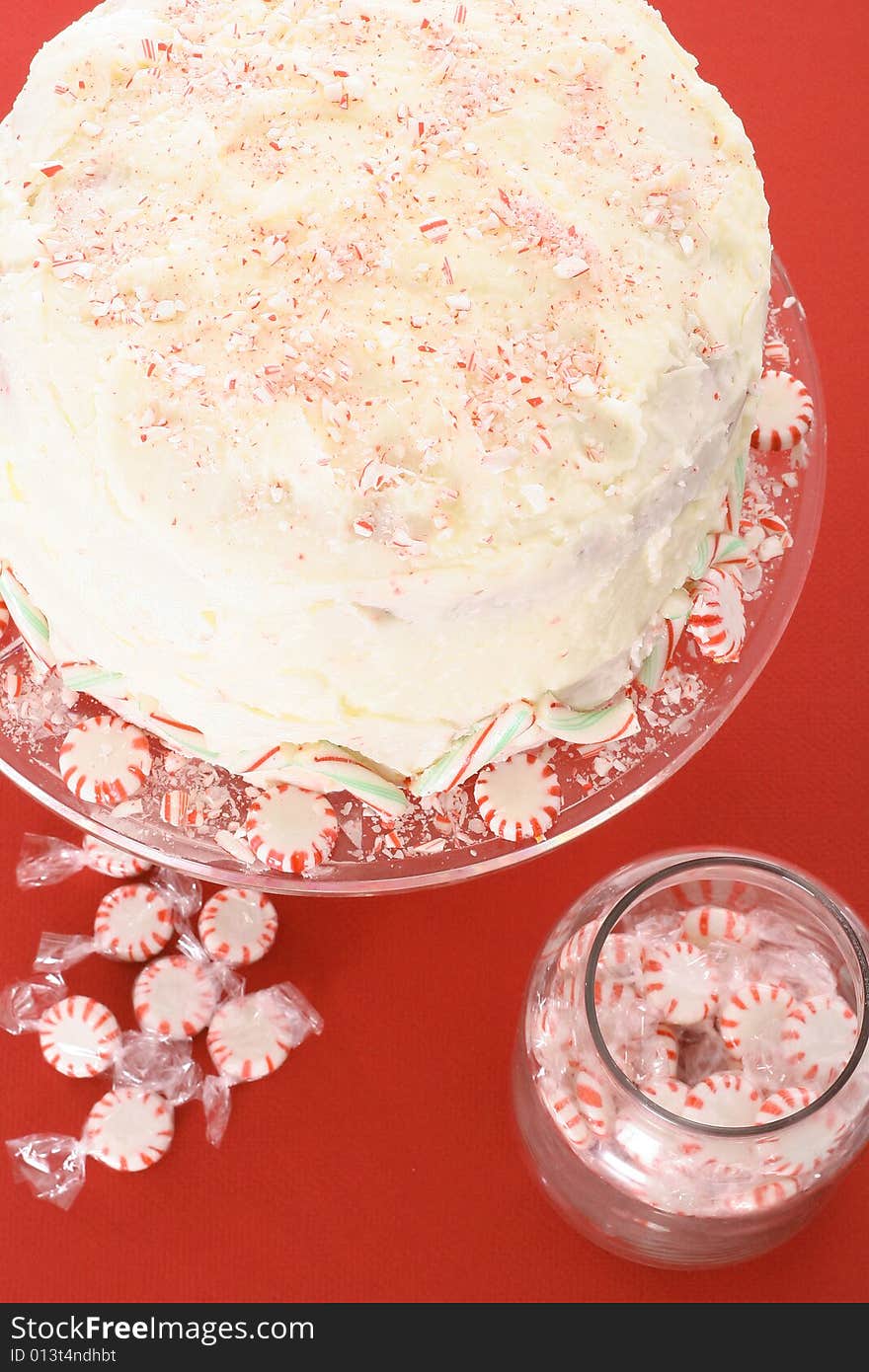 Beautiful bakery peppermint cake isolated on red